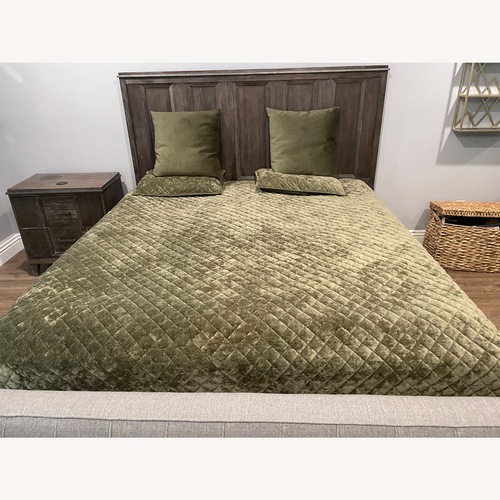 Used Dark Brown Wood King Bed for sale on AptDeco