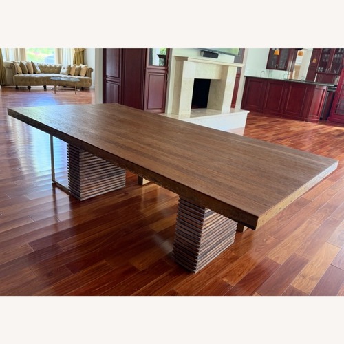 Used Brown Wood Dining Table for sale on AptDeco
