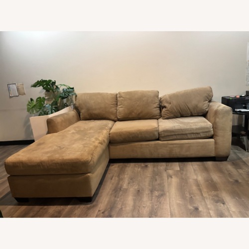Used Light Brown Polyurethane 2 Piece Sectional for sale on AptDeco