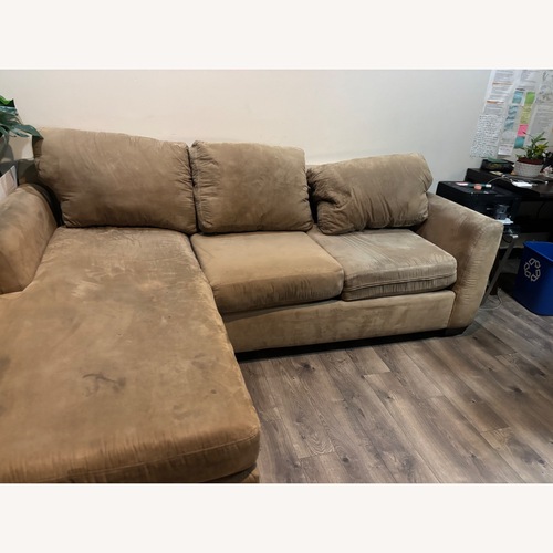 Used Light Brown Polyurethane 2 Piece Sectional for sale on AptDeco