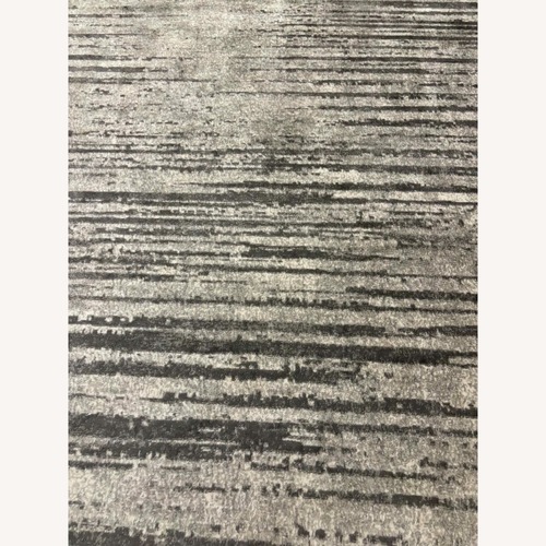 Used Contemporary Faded Elsa Grey 10x14 Area Rug for sale on AptDeco