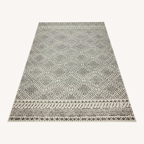 Used Light Gray Area Rug 10' x 14' for sale on AptDeco