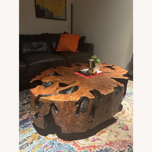 Used Dark Brown Solid Wood Coffee Table for sale on AptDeco