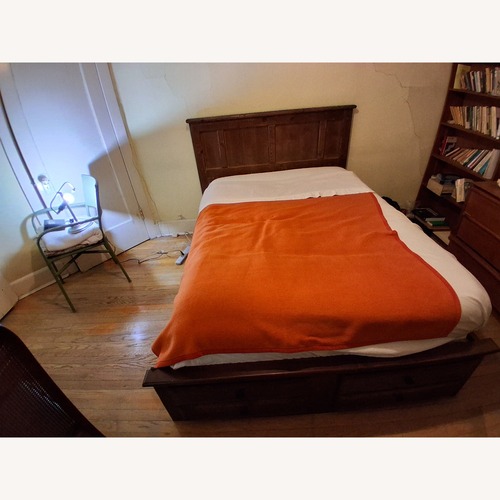 Used The Roomplace Dark Brown Wood Full Bed for sale on AptDeco