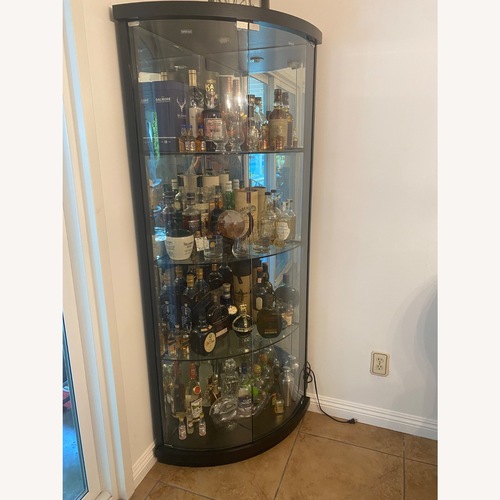 Used Corner Glass Display Cabinet  for sale on AptDeco