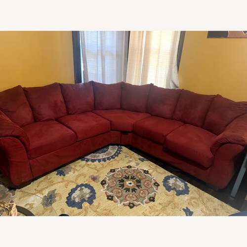 Used Ashley Red Sectional for sale on AptDeco