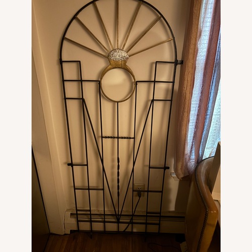 Used Arched Decorative Black Wrought Iron Gate for sale on AptDeco