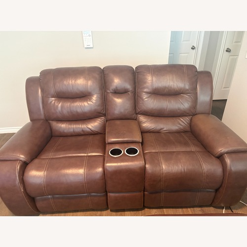 Used Dark Brown Power Reclining Loveseat with Cupholder for sale on AptDeco