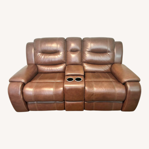 Used Dark Brown Power Reclining Loveseat with Cupholder for sale on AptDeco