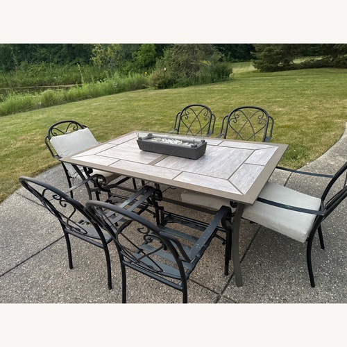 Used 7-Piece Patio Dining Set with Gas Fire Pit  for sale on AptDeco