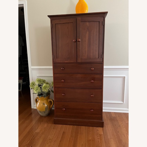Used Ethan Allen Dark Brown Wood Armoire for sale on AptDeco