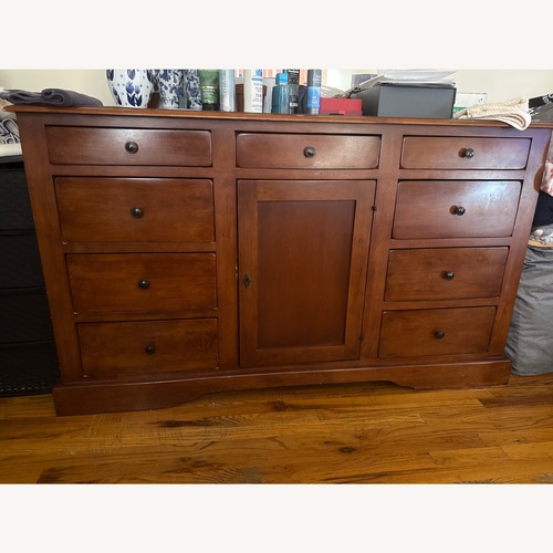 Used 1000% Mahogany Wood Dresser for sale on AptDeco