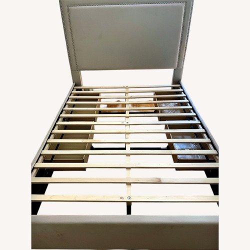 Used Bob's Discount Furniture Natural Wood Full Bed for sale on AptDeco