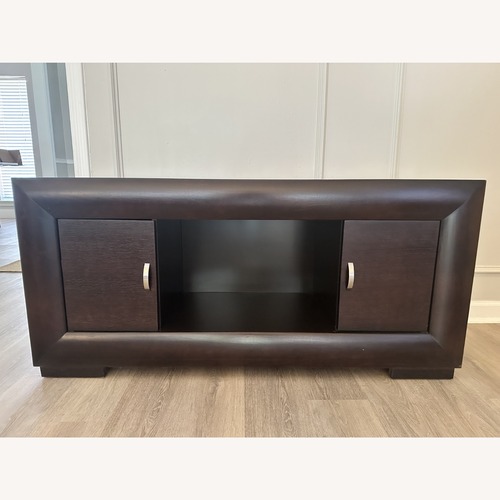 Used Rooms To Go Dark Brown Wood Media Storage TV Stand for sale on AptDeco