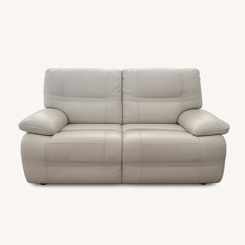 Used Rooms To Go White Leather Loveseat for sale on AptDeco