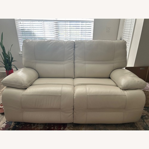 Used Rooms To Go White Leather Loveseat for sale on AptDeco