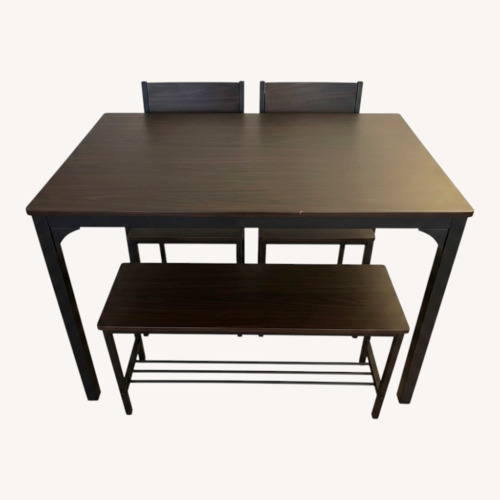 Used Dark Brown Wood Dining Set for sale on AptDeco