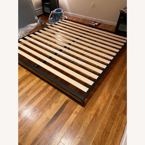 Used Dark Brown Metal King Bed With Wooden Design for sale on AptDeco