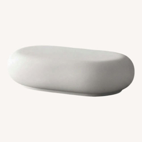 Used Crate & Barrel White Pebble 59" Coffee Table for sale on AptDeco