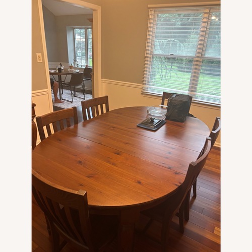 Used Pottery Barn Dark Brown Dining Table for sale on AptDeco