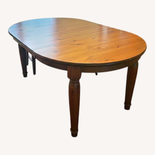 Used Pottery Barn Dark Brown Dining Table for sale on AptDeco