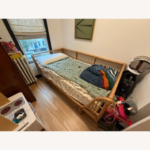 Used World Market Honey Rattan Daybed Frame for sale on AptDeco