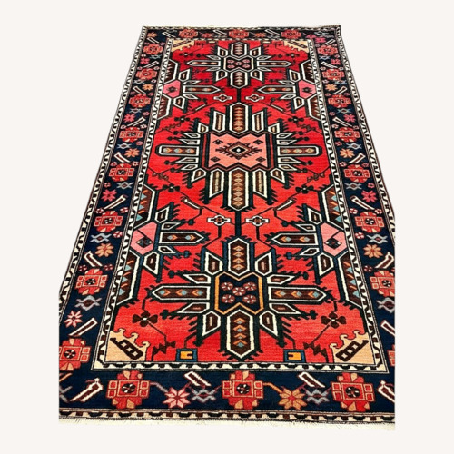 Used Red Fabric Area Rug 1' x 5' for sale on AptDeco