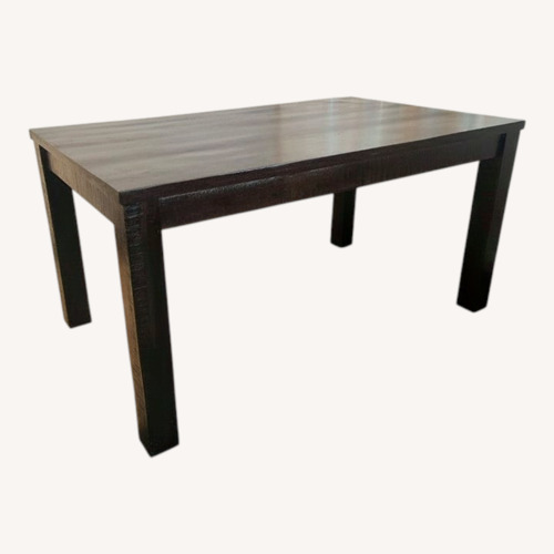 Used Havana Dark Brown Wood Dining Table for sale on AptDeco