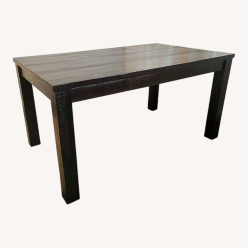 Used Havana Dark Brown Wood Dining Table for sale on AptDeco