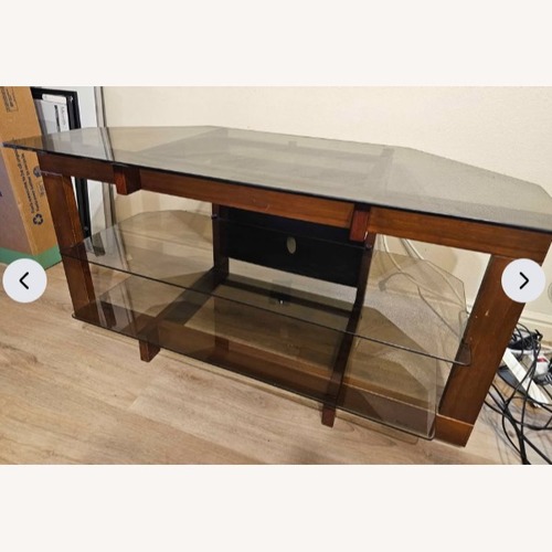 Used Glass and Wood TV Stand for sale on AptDeco