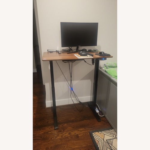 Used Amazon Dark Brown Wood Standing Desk for sale on AptDeco