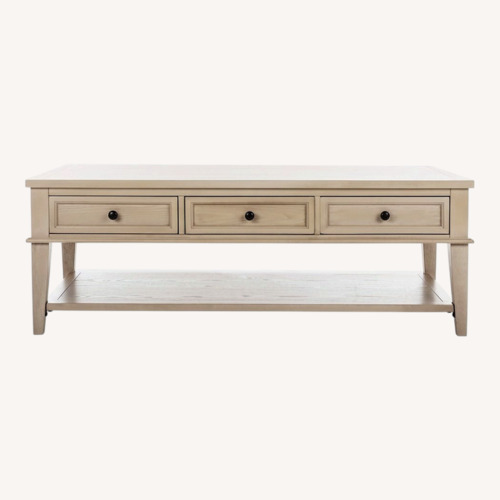 Used Safavieh Manelin White Washed Wood Coffee Table for sale on AptDeco
