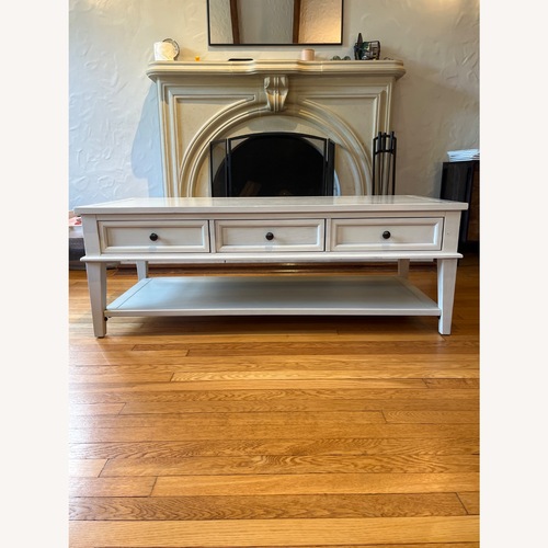 Used Safavieh Manelin White Washed Wood Coffee Table for sale on AptDeco