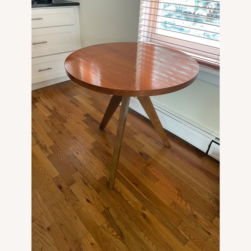 Used West Elm Tripod  Natural Wood Dining Table for sale on AptDeco