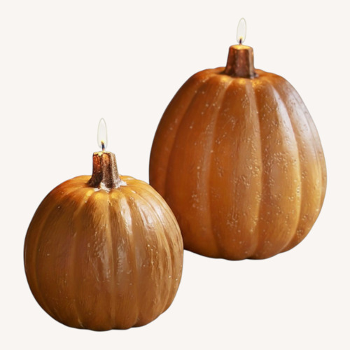 Used Pottery Barn Pumpkin Candles 2 Different Sizes for sale on AptDeco