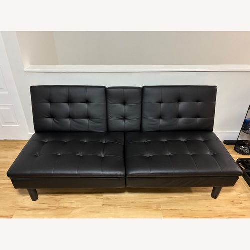 Used Walmart Black Faux Leather Futon for sale on AptDeco