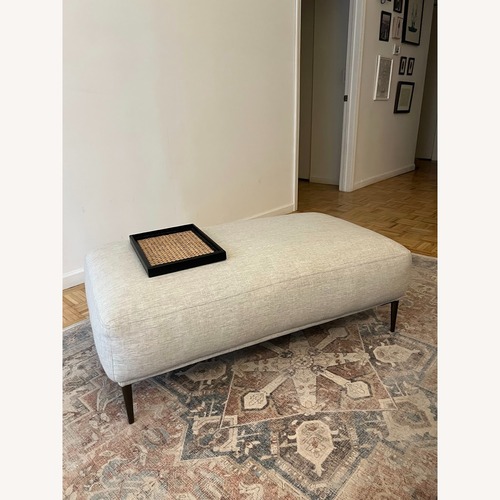 Used Article Abisko Light Gray Fabric Ottoman for sale on AptDeco