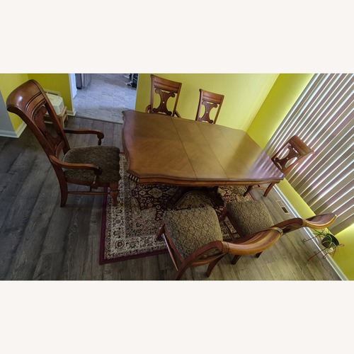 Used Value City Furniture Light Brown Wood Dining Set for sale on AptDeco