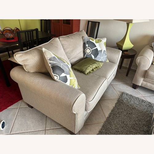 Used Rooms to Go Lilith Pond Taupe Loveseat for sale on AptDeco