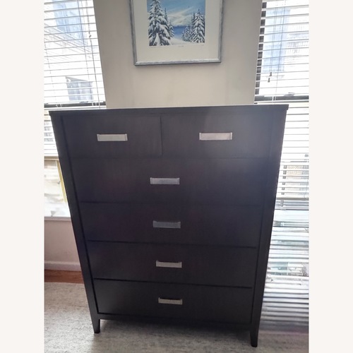 Used Raymour & Flanigan Dark Brown Wood Dresser for sale on AptDeco