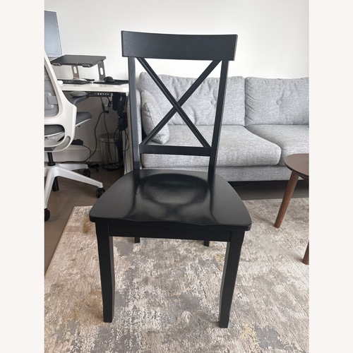 Used 4 Black Wood Dining Chairs for sale on AptDeco