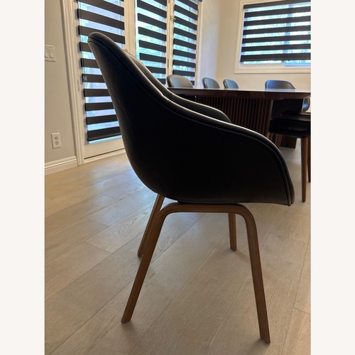 Used About a Chair 23 Armchair in Obsidian Leather  for sale on AptDeco