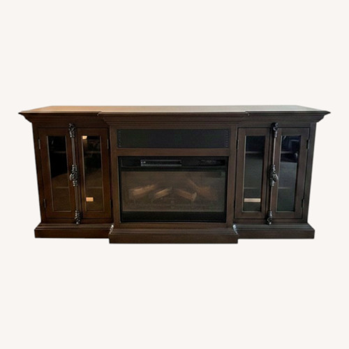 Used Wooden Entertainment Center With Electric Heater for sale on AptDeco
