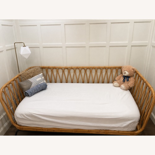 Used Crate & Barrel Rattan Daybed for sale on AptDeco