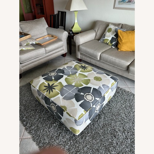 Used Rooms To Go Fabric Ottoman for sale on AptDeco
