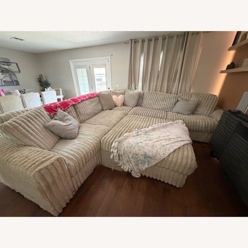 Used Ashley Furniture 3-piece Sectional With Ottoman  for sale on AptDeco