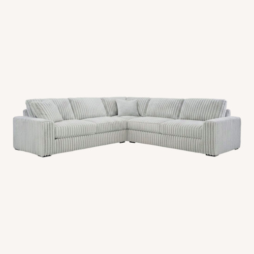 Used Ashley Furniture 3-piece Sectional With Ottoman  for sale on AptDeco