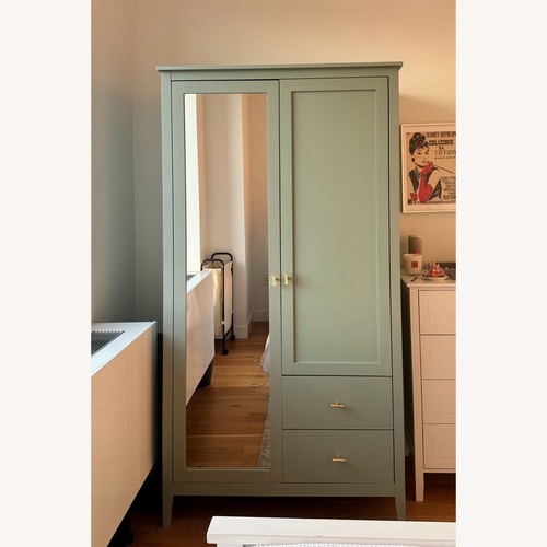 Used Green Wood Armoire with Mirror for sale on AptDeco