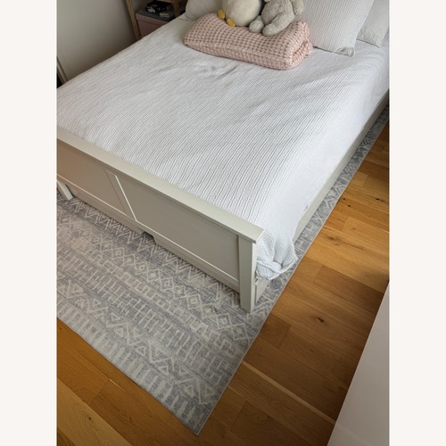 Used Macy's Blue Area Rug 5'3 x 8'7 for sale on AptDeco
