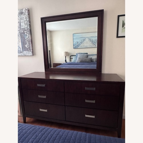 Used Raymour & Flanigan 6-Drawer Dresser with Mirror for sale on AptDeco